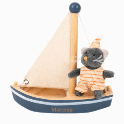 Barque en bois avec peluche...